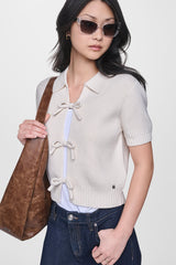 SHORT SLEEVE TIE FRONT POLO SWEATER